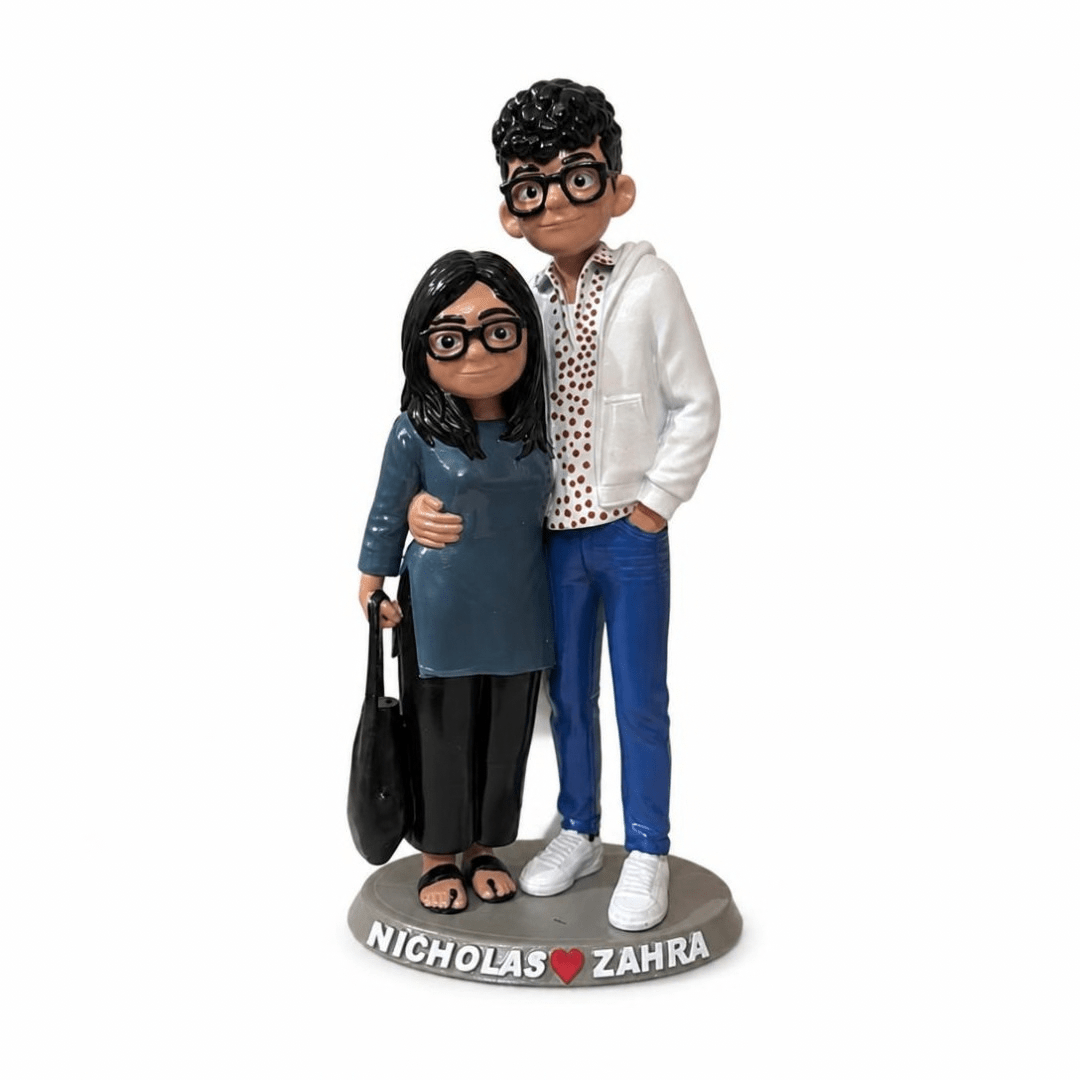 Side view of the custom couple figurine with glasses, tote bag and white sneakers
